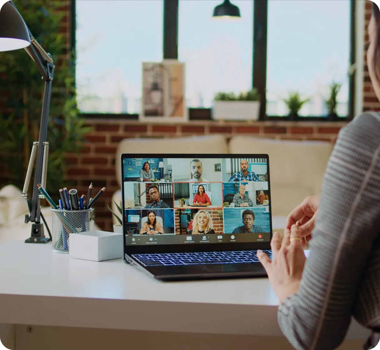 Virtual team meeting on laptop screen